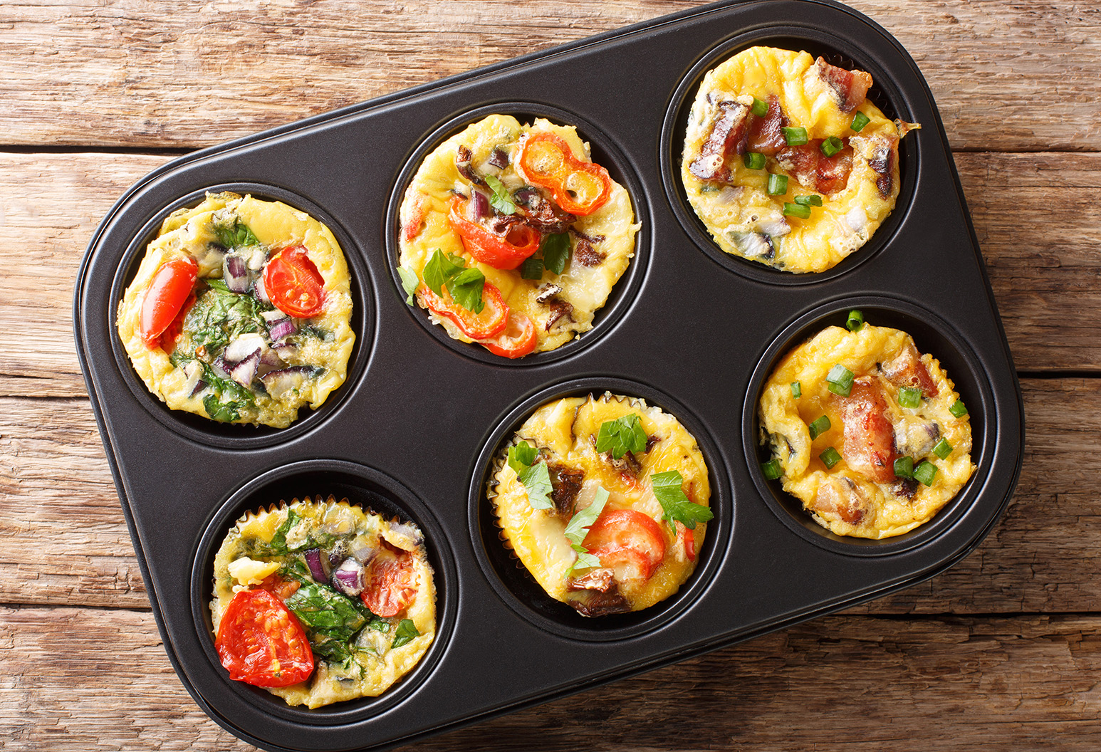 egg muffins omelet with bacon, tomatoes, spinach and mushrooms c