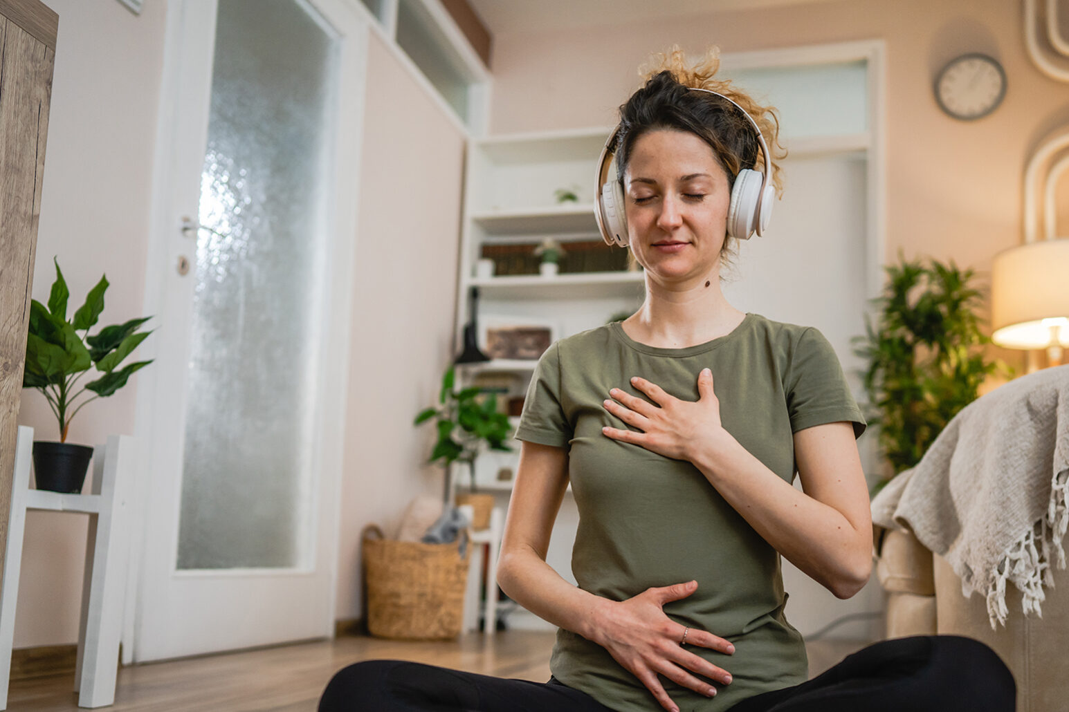 One woman sit on the floor practice online guided meditation sel