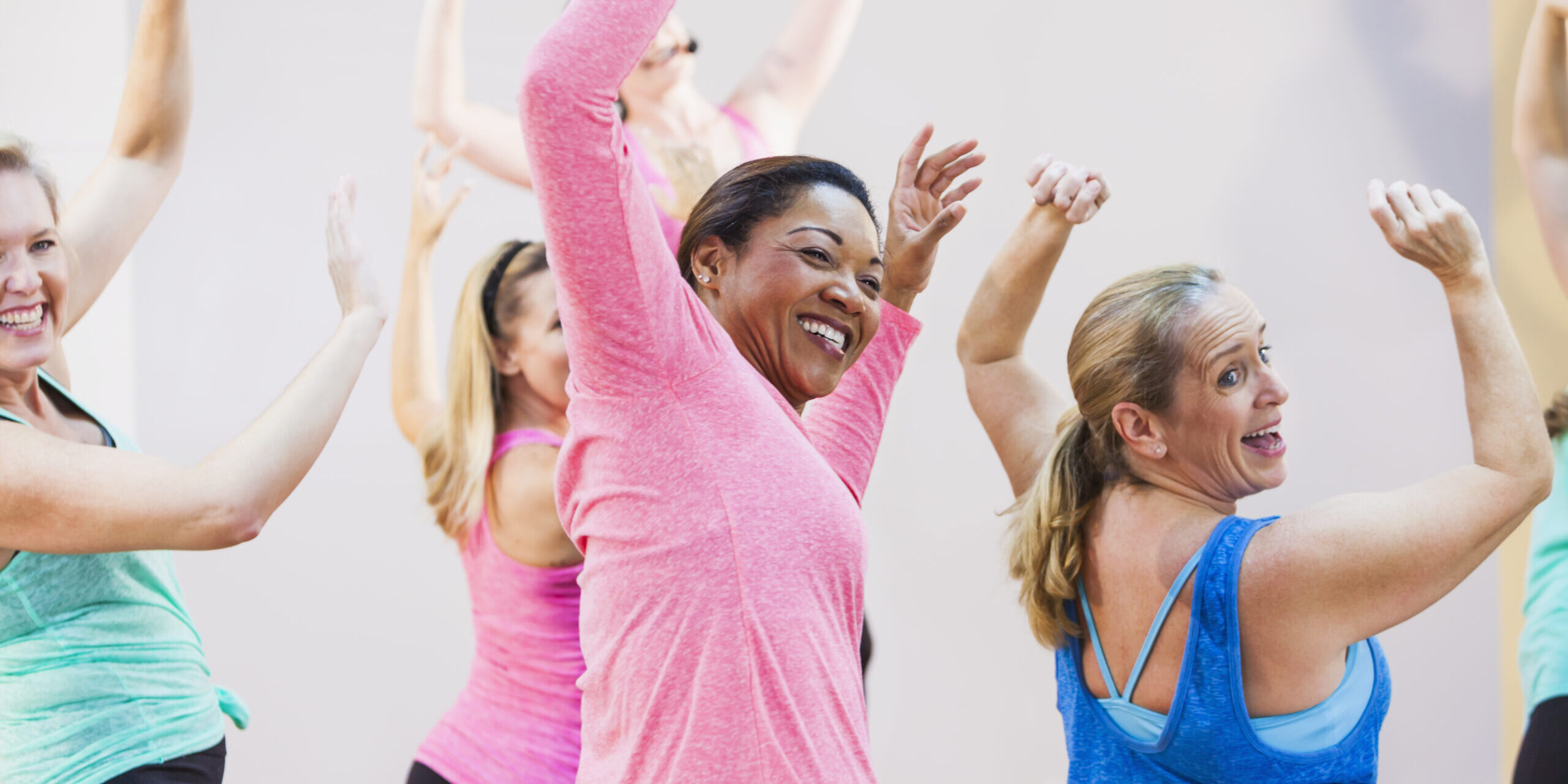 Group of multi-ethnic women in exercise class