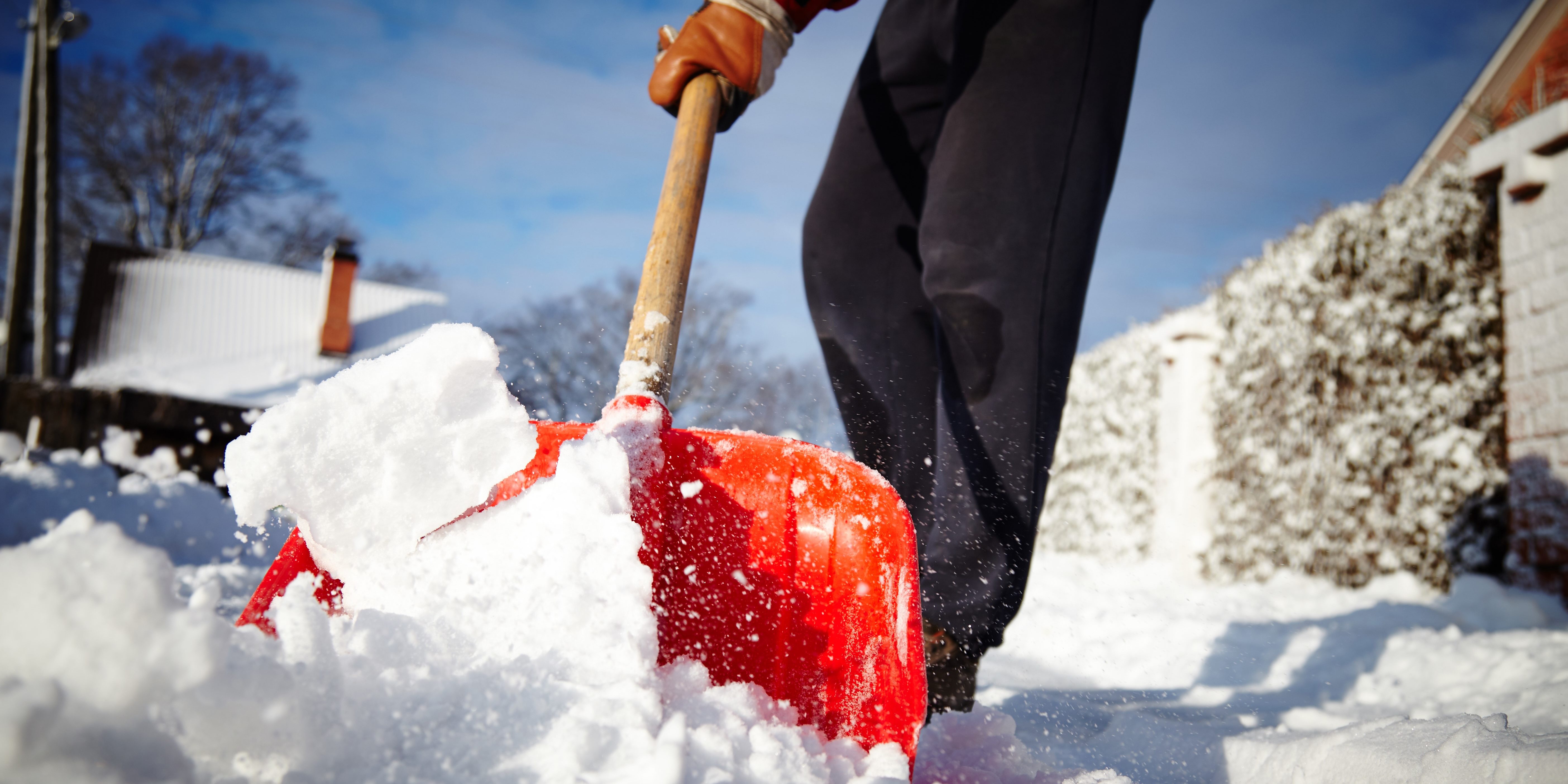 shoveling snow, winter, preventing back & neck pain injury shoveling snow