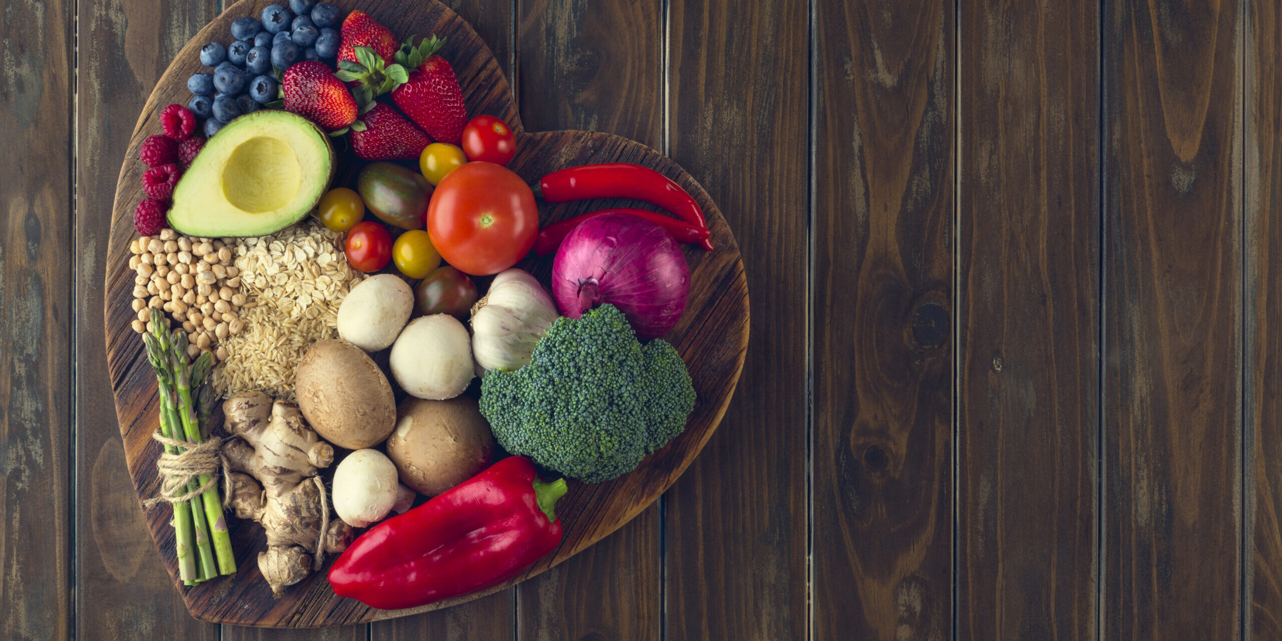 Healthy food on a heart shape cutting board