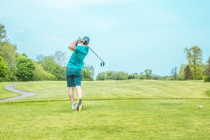 Man playing golf