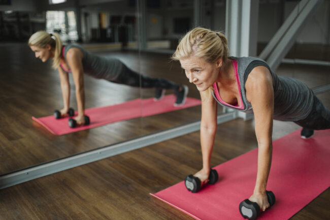 Woman exercising in gym