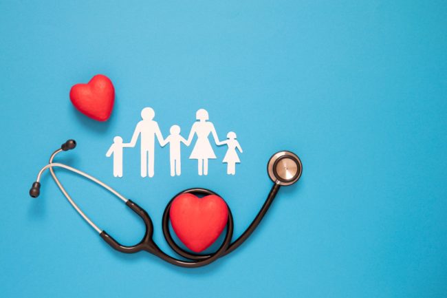 Family History of Heart Disease family holding hands surrounded by graphic of a stethoscope and a heart