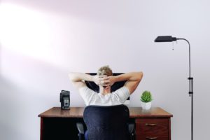 Man sitting at a desk, working from home