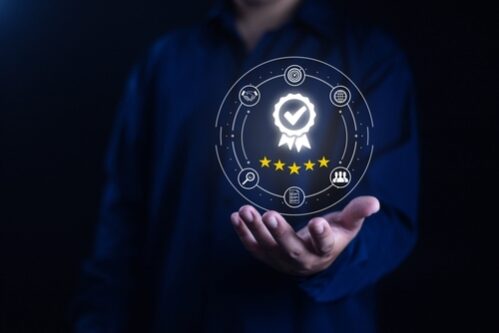 A,Hand,Holding,Glowing,Icon,Quality.,Is,Quality,Assurance,Guarantee,